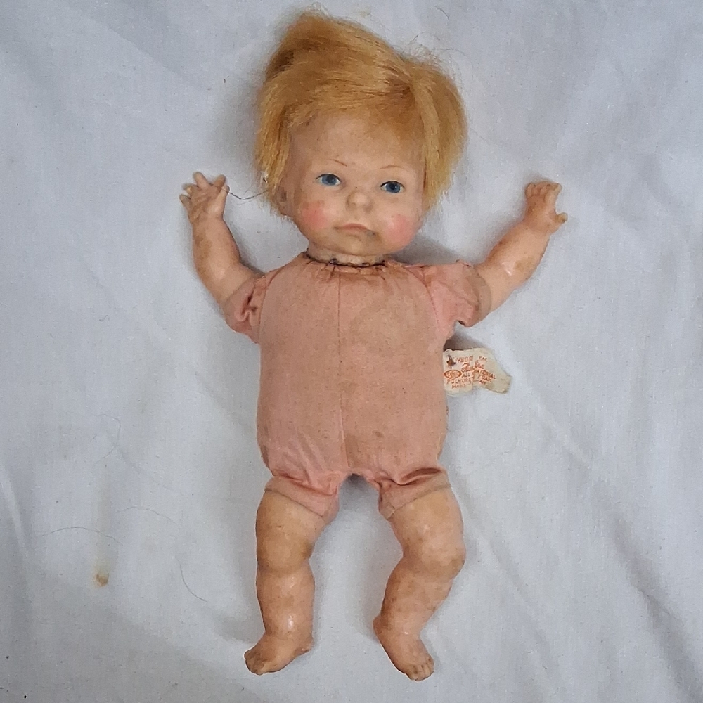 Adorable Pink Baby Doll with Blonde Hair